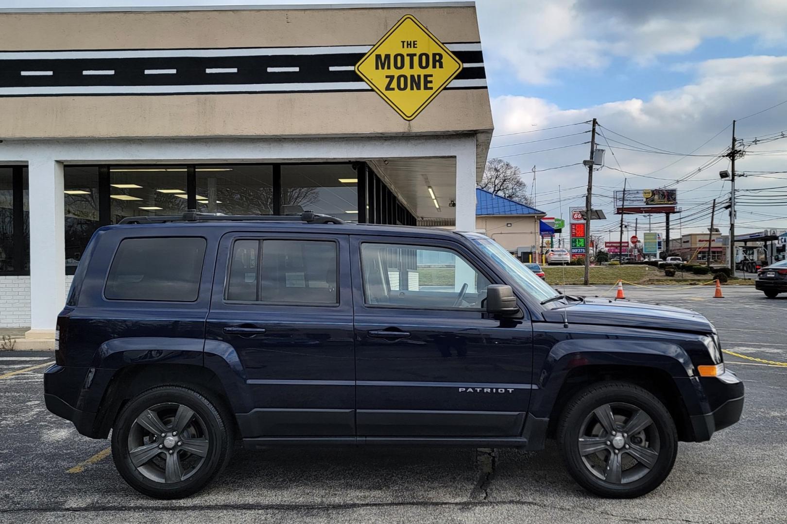 2015 Blue /Black Jeep Patriot Latitude (1C4NJRFB0FD) with an 4-Cyl, 2.4 Liter engine, Automatic transmission, located at 341 N White Horse Pike, Lawnside, NJ, 08045, (856) 262-9500, 39.855621, -75.027451 - Photo#2